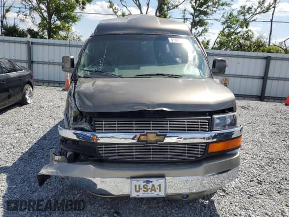 2006 Chevrolet Express Passenger z VIN 1GBFG15T161154772, wystawiony jako Copart lot #51090025 z przebiegiem 114 152 mil mil oraz Szkoda całkowita • Salvage title. Historia ofert i sprzedaży dostępna na DreamBid. Obrazek 5.