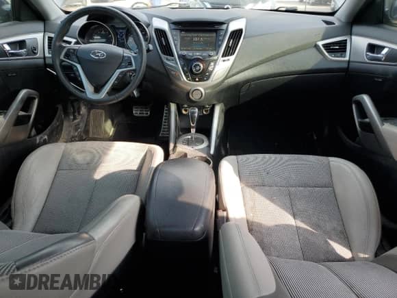 2013 Hyundai Veloster w/Gray Int z VIN KMHTC6AD9DU131253, wystawiony jako Copart lot #80507035 z przebiegiem 179 234 mil mil oraz Szkoda całkowita • Salvage title. Historia ofert i sprzedaży dostępna na DreamBid. Obrazek 8.