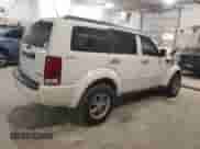 2009 Dodge Nitro SXT with VIN 1D8GU28K19W544135, listed as a Copart auction lot 84706354 with 98,925 mi miles and Salvage title. Bid and sale history available at DreamBid. Image 3.