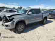 2019 Toyota Tacoma TRD Off Road z VIN 3TMCZ5ANXKM250954, wystawiony jako Copart lot #65703125 z przebiegiem 53 473 mil mil oraz Szkoda całkowita • Salvage title. Historia ofert i sprzedaży dostępna na DreamBid. Obrazek 1.