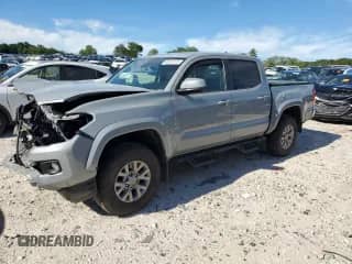 2019 Toyota Tacoma TRD Off Road with VIN 3TMCZ5ANXKM250954, listed as a Copart auction lot 65703125 with 53,473 mi miles and Salvage title. Bid and sale history available at DreamBid. Image 1.