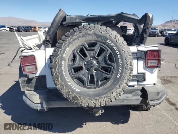 2013 Jeep Wrangler Moab with VIN 1C4AJWBG6DL612352, listed as a Copart auction lot 66005495 with 132,036 mi miles and Salvage title. Bid and sale history available at DreamBid. Image 6.