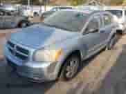 2009 Dodge Caliber SE with VIN 1B3HB28A69D169338, listed as a IAAI auction lot 41872461 with 101,675 mi miles and . Bid and sale history available at DreamBid. Image 2.