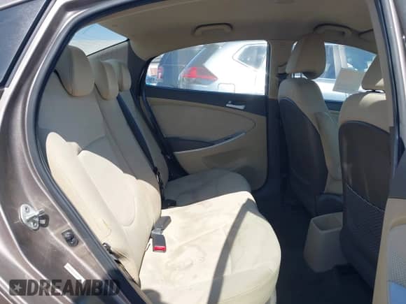 2013 Hyundai Accent GLS z VIN KMHCT4AE2DU317648, wystawiony jako IAAI lot #42934017 z przebiegiem 172 717 mil mil oraz . Historia ofert i sprzedaży dostępna na DreamBid. Obrazek 8.