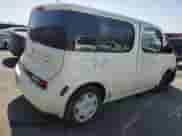 2010 Nissan Cube S Krom Edition z VIN JN8AZ2KR3AT156488, wystawiony jako Copart lot #69114295 z przebiegiem 90 461 mil mil oraz Szkoda całkowita • Salvage title. Historia ofert i sprzedaży dostępna na DreamBid. Obrazek 3.