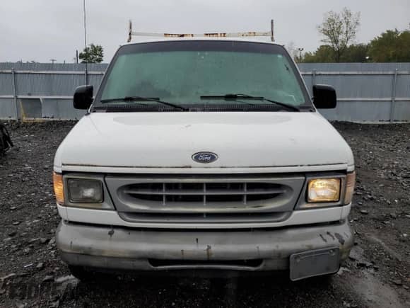 2000 Ford Econoline Cargo с VIN 1FTRE14W2YHB20277, выставлен на аукционе Copart как лот 85318405 с пробегом 101 667 миль миль и Чистый • Clean title. История ставок и продаж доступна на DreamBid. Изображение 5.