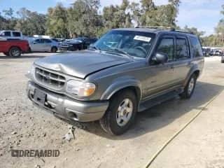 2000 Ford Explorer Limited with VIN 1FMDU75E9YUB50157, listed as a Copart auction lot 88743875 with 184,376 mi miles and Salvage title. Bid and sale history available at DreamBid. Image 1.