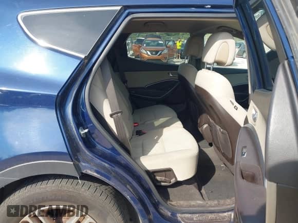 2018 Hyundai Santa Fe 2.4L z VIN 5XYZTDLB7JG562119, wystawiony jako IAAI lot #43221548 z przebiegiem 244 228 mil mil oraz . Historia ofert i sprzedaży dostępna na DreamBid. Obrazek 8.