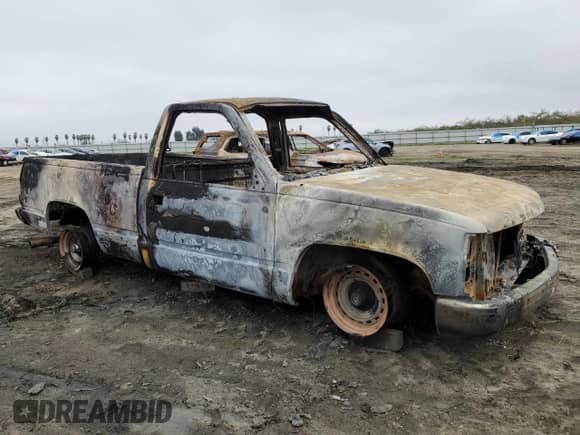1998 GMC Sierra 1500 z VIN 1GTEC14W8WZ535356, wystawiony jako Copart lot #85422894 z przebiegiem Nie podano mil oraz Nie do naprawy • Non repairable. Historia ofert i sprzedaży dostępna na DreamBid. Obrazek 4.