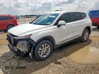 2019 Hyundai Santa Fe SE with VIN 5NMS23AD7KH044358, listed as a Copart auction lot 70698745 with 67,867 mi miles and Salvage title. Bid and sale history available at DreamBid. Image 1.