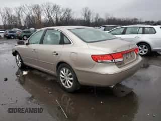 2006 Hyundai Azera SE с VIN KMHFC46FX6A089823, выставлен на аукционе Copart как лот 83678044 с пробегом 161 787 миль миль и Списание • Salvage title. История ставок и продаж доступна на DreamBid. Изображение 2.