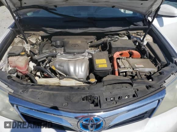 2012 Toyota Camry XLE z VIN 4T1BD1FK8CU022512, wystawiony jako Copart lot #82413865 z przebiegiem Nie podano mil oraz Szkoda całkowita • Salvage title. Historia ofert i sprzedaży dostępna na DreamBid. Obrazek 11.