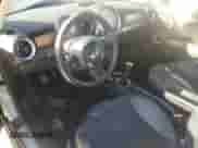 2012 MINI Hardtop z VIN WMWSU3C58CT186442, wystawiony jako Copart lot #87010695 z przebiegiem 88 173 mil mil oraz Szkoda całkowita • Salvage title. Historia ofert i sprzedaży dostępna na DreamBid. Obrazek 8.