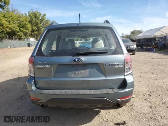 2013 Subaru Forester X z VIN JF2SHABC7DG427348, wystawiony jako Copart lot #84653135 z przebiegiem 133 453 mil mil oraz Szkoda całkowita • Salvage title. Historia ofert i sprzedaży dostępna na DreamBid. Obrazek 6.