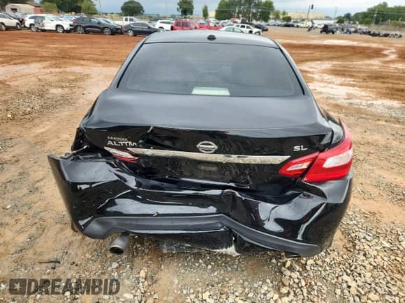 2016 Nissan Altima SR with VIN 1N4AL3AP9GC194745, listed as a Copart auction lot 82051095 with 57,656 mi miles and Salvage title. Bid and sale history available at DreamBid. Image 6.