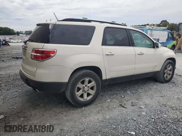 2007 Saturn Outlook XR with VIN 5GZER23787J101418, listed as a Copart auction lot 70452555 with 385,954 mi miles and Salvage title. Bid and sale history available at DreamBid. Image 3.