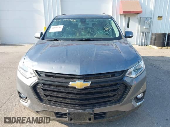 2020 Chevrolet Traverse LT z VIN 1GNEVHKW0LJ106607, wystawiony jako IAAI lot #42695708 z przebiegiem 76 700 mil mil oraz . Historia ofert i sprzedaży dostępna na DreamBid. Obrazek 12.