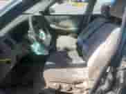 2001 Hyundai Sonata GLS z VIN KMHWF35V11A485934, wystawiony jako Copart lot #69853585 z przebiegiem 120 924 mil mil oraz Szkoda całkowita • Salvage title. Historia ofert i sprzedaży dostępna na DreamBid. Obrazek 7.