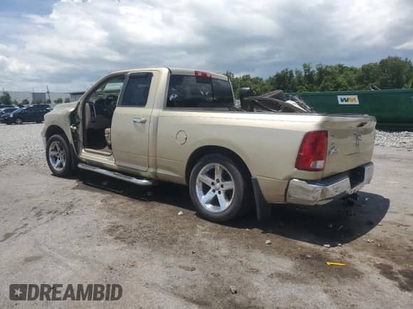 2011 Ram 1500 Big Horn z VIN 1D7RB1GP2BS570282, wystawiony jako Copart lot #66951015 z przebiegiem Nie podano mil oraz Szkoda całkowita • Salvage title. Historia ofert i sprzedaży dostępna na DreamBid. Obrazek 2.