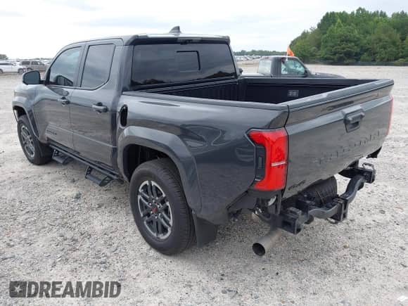 2024 Toyota Tacoma TRD Off Road with VIN 3TMLB5JN9RM060836, listed as a IAAI auction lot 43181595 with 21,563 mi miles and . Bid and sale history available at DreamBid. Image 3.