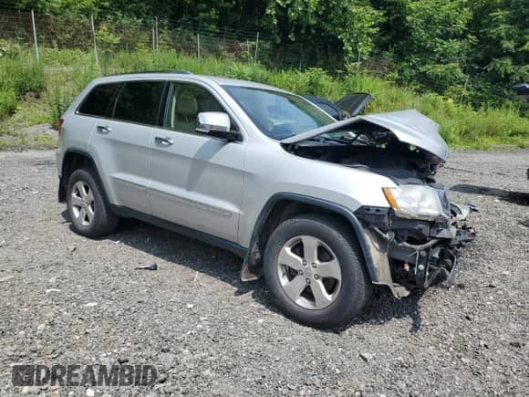 2013 Jeep Grand Cherokee Limited z VIN 1C4RJFBG5DC636189, wystawiony jako Copart lot #64136425 z przebiegiem 108 082 mil mil oraz Szkoda całkowita • Salvage title. Historia ofert i sprzedaży dostępna na DreamBid. Obrazek 4.