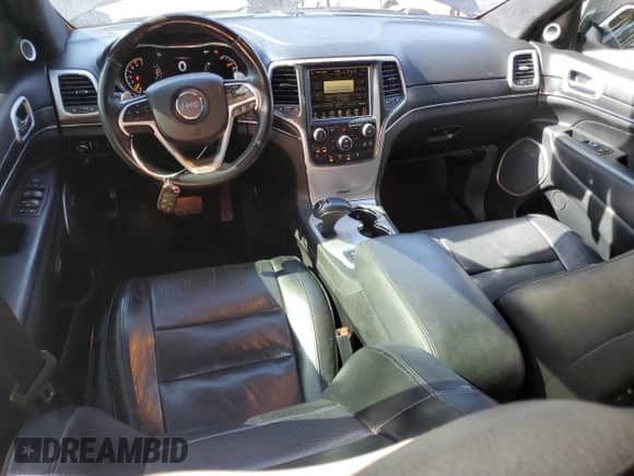 2014 Jeep Grand Cherokee Summit with VIN 1C4RJFJTXEC127795, listed as a Copart auction lot 58586945 with 124,181 mi miles and Salvage title. Bid and sale history available at DreamBid. Image 8.