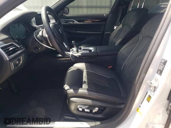 2019 BMW 7 Series 750i with VIN WBA7F0C55KGM24513, listed as a Copart auction lot 61728595 with 26,303 mi miles and Salvage title. Bid and sale history available at DreamBid. Image 7.