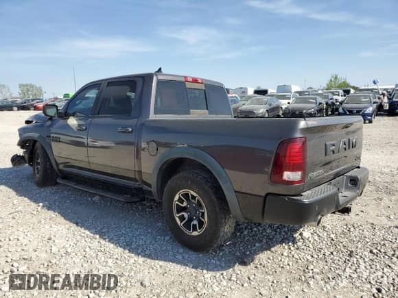 2017 Ram 1500 Rebel z VIN 1C6RR7YT4HS581594, wystawiony jako Copart lot #82583984 z przebiegiem 95 239 mil mil oraz Szkoda całkowita • Salvage title. Historia ofert i sprzedaży dostępna na DreamBid. Obrazek 2.