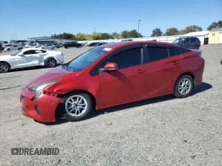 2016 Toyota Prius Two z VIN JTDKBRFU7G3512610, wystawiony jako Copart lot #82241055 z przebiegiem 237 303 mil mil oraz Szkoda całkowita • Salvage title. Historia ofert i sprzedaży dostępna na DreamBid. Obrazek 1.