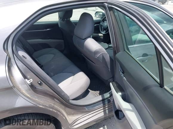 2022 Toyota Camry Hybrid LE with VIN 4T1C31AK9NU036999, listed as a IAAI auction lot 42741455 with 68,970 mi miles and . Bid and sale history available at DreamBid. Image 8.