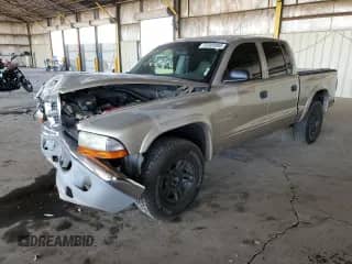 2002 Dodge Dakota SLT with VIN 1B7HL48N42S537026, listed as a Copart auction lot 53305005 with 175,924 mi miles and Salvage title. Bid and sale history available at DreamBid. Image 1.