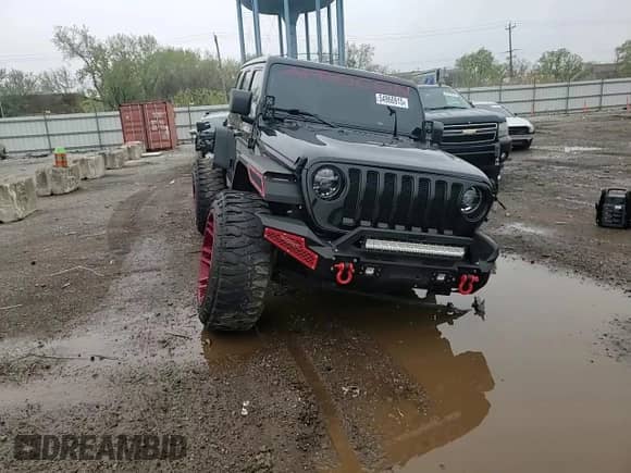 2021 Jeep Wrangler Unlimited Sahara Altitude z VIN 1C4HJXEG4MW731421, wystawiony jako Copart lot #54960915 z przebiegiem 105 243 mil mil oraz Szkoda całkowita • Salvage title. Historia ofert i sprzedaży dostępna na DreamBid. Obrazek 13.