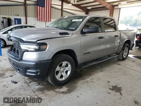 2025 Ram 1500 Tradesman with VIN 1C6RRFGG3SN570350, listed as a Copart auction lot 67477365 with 22,554 mi miles and Salvage title. Bid and sale history available at DreamBid. Image 1.