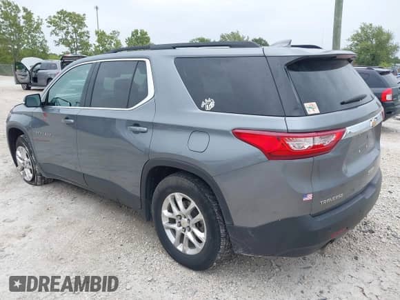 2021 Chevrolet Traverse LT Cloth z VIN 1GNERGKWXMJ101835, wystawiony jako IAAI lot #43141562 z przebiegiem 94 711 mil mil oraz . Historia ofert i sprzedaży dostępna na DreamBid. Obrazek 3.