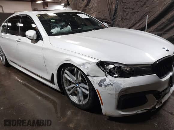 2019 BMW 7 Series 740i xDrive with VIN WBA7E4C59KGV70391, listed as a IAAI auction lot 41531991 with 70,017 mi miles and . Bid and sale history available at DreamBid. Image 6.