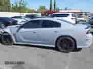 2021 Dodge Charger Scat Pack z VIN 2C3CDXGJ7MH594777, wystawiony jako IAAI lot #43044838 z przebiegiem 75 520 mil mil oraz . Historia ofert i sprzedaży dostępna na DreamBid. Obrazek 15.