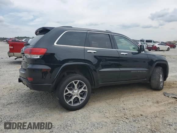 2020 Jeep Grand Cherokee Overland with VIN 1C4RJFCGXLC344406, listed as a Copart auction lot 81594155 with 98,750 mi miles and Salvage title. Bid and sale history available at DreamBid. Image 3.