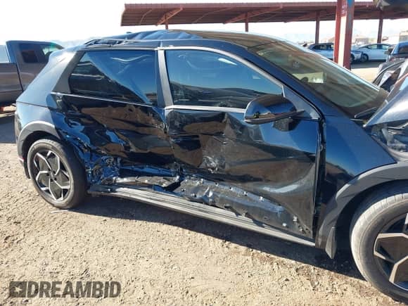 2023 Hyundai Ioniq 5 SE with VIN KM8KM4AE4PU186526, listed as a IAAI auction lot 43348590 with 26,965 mi miles and . Bid and sale history available at DreamBid. Image 6.