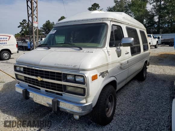 1995 Chevrolet Chevy Van с VIN 1GBEG25K7SF129087, выставлен на аукционе Copart как лот 84625695 с пробегом 170 547 миль миль и Чистый • Clean title. История ставок и продаж доступна на DreamBid. Изображение 1.
