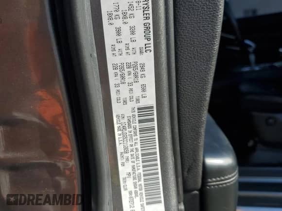 2012 Dodge Durango Crew z VIN 1C4RDJDG5CC112658, wystawiony jako Copart lot #70361875 z przebiegiem 215 458 mil mil oraz Czysty tytuł • Clean title. Historia ofert i sprzedaży dostępna na DreamBid. Obrazek 13.