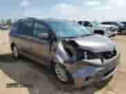 2012 Toyota Sienna XLE z VIN 5TDDK3DC1CS040350, wystawiony jako Copart lot #68861645 z przebiegiem 168 410 mil mil oraz Szkoda całkowita • Salvage title. Historia ofert i sprzedaży dostępna na DreamBid. Obrazek 4.