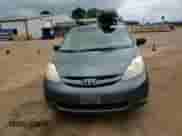 2010 Toyota Sienna LE с VIN 5TDKK4CC5AS343448, выставлен на аукционе Copart как лот 81763345 с пробегом 166 379 миль миль и Списание • Salvage title. История ставок и продаж доступна на DreamBid. Изображение 14.