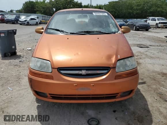2006 Chevrolet Aveo LS с VIN KL1TD566X6B640909, выставлен на аукционе Copart как лот 56497505 с пробегом 168 781 миль миль и Списание • Salvage title. История ставок и продаж доступна на DreamBid. Изображение 5.