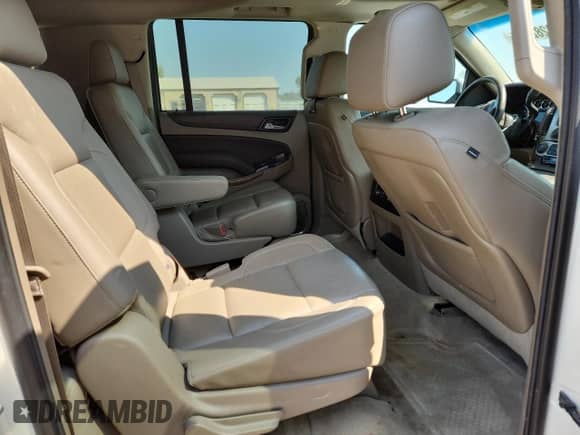 2015 Chevrolet Suburban LTZ с VIN 1GNSKKKC4FR159394, выставлен на аукционе Copart как лот 80282745 с пробегом 165 634 миль миль и Списание • Salvage title. История ставок и продаж доступна на DreamBid. Изображение 11.