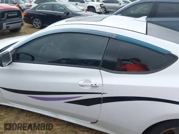2015 Hyundai Genesis Coupe Ultimate z VIN KMHHU6KJ3FU128598, wystawiony jako IAAI lot #40511646 z przebiegiem Nie podano mil oraz . Historia ofert i sprzedaży dostępna na DreamBid. Obrazek 13.