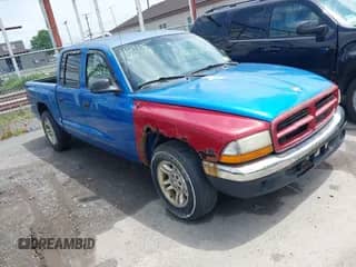 2001 Dodge Dakota Sport with VIN 1B7GL2AN31S115001, listed as a IAAI auction lot 42452634 with Not provided miles and . Bid and sale history available at DreamBid. Image 1.