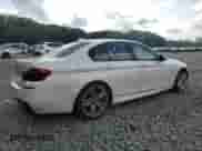 2016 BMW 5 Series 550i xDrive with VIN WBAKP9C55GD981149, listed as a Copart auction lot 65976265 with 121,838 mi miles and Salvage title. Bid and sale history available at DreamBid. Image 3.