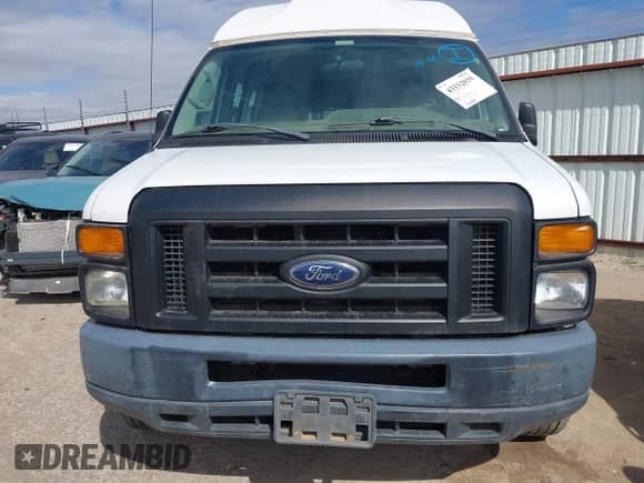 2012 Ford Econoline Cargo Commercial with VIN 1FTNS2EW1CDA41355, listed as a IAAI auction lot 43332039 with 134,489 mi miles and . Bid and sale history available at DreamBid. Image 12.