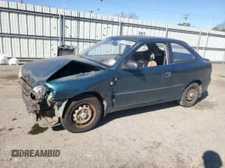 1999 Hyundai Accent L z VIN KMHVD14N4XU456698, wystawiony jako Copart lot #41733345 z przebiegiem 197 574 mil mil oraz Szkoda całkowita • Salvage title. Historia ofert i sprzedaży dostępna na DreamBid. Obrazek 1.