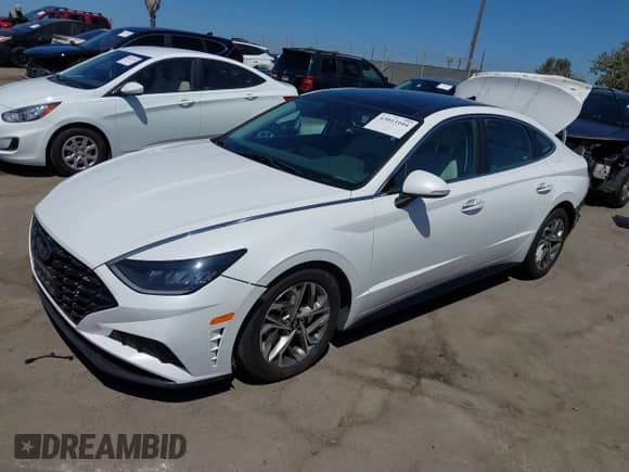 2021 Hyundai Sonata SEL с VIN KMHL14JA0MA151831, выставлен на аукционе IAAI как лот 43013104 с пробегом 90 519 миль миль и . История ставок и продаж доступна на DreamBid. Изображение 2.